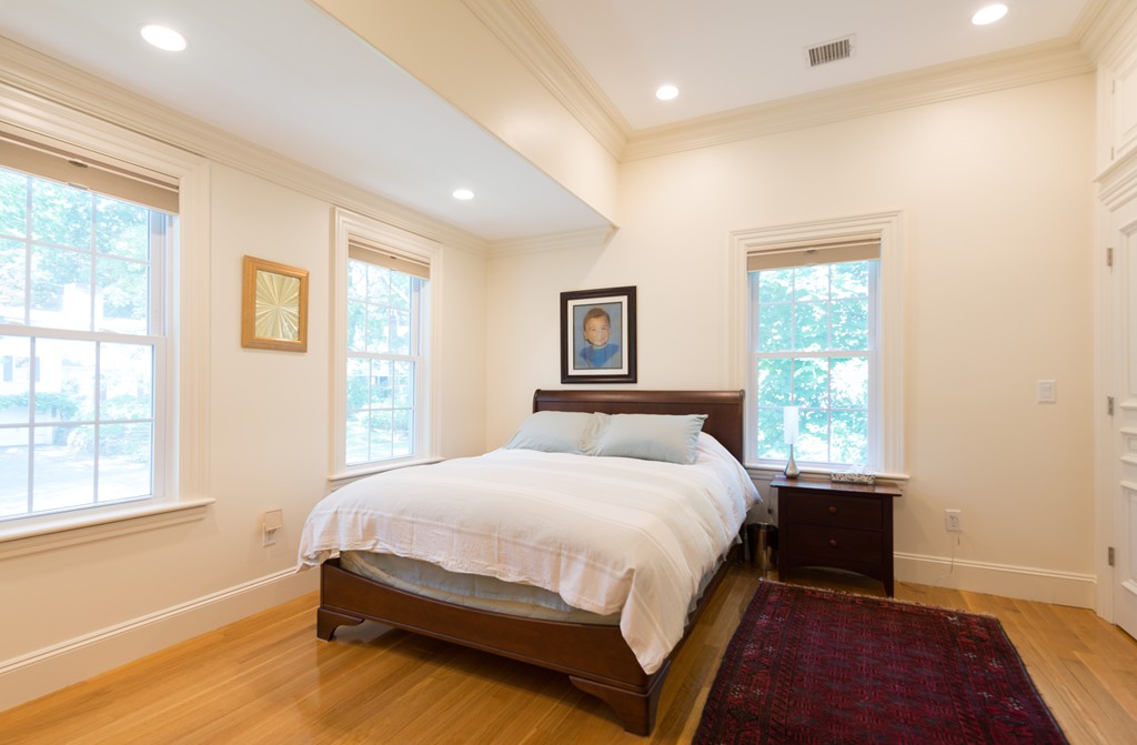 139 Arnold Road Newton, MA 02459 - Photo 14 of 30 a bedroom with a bed and a window
