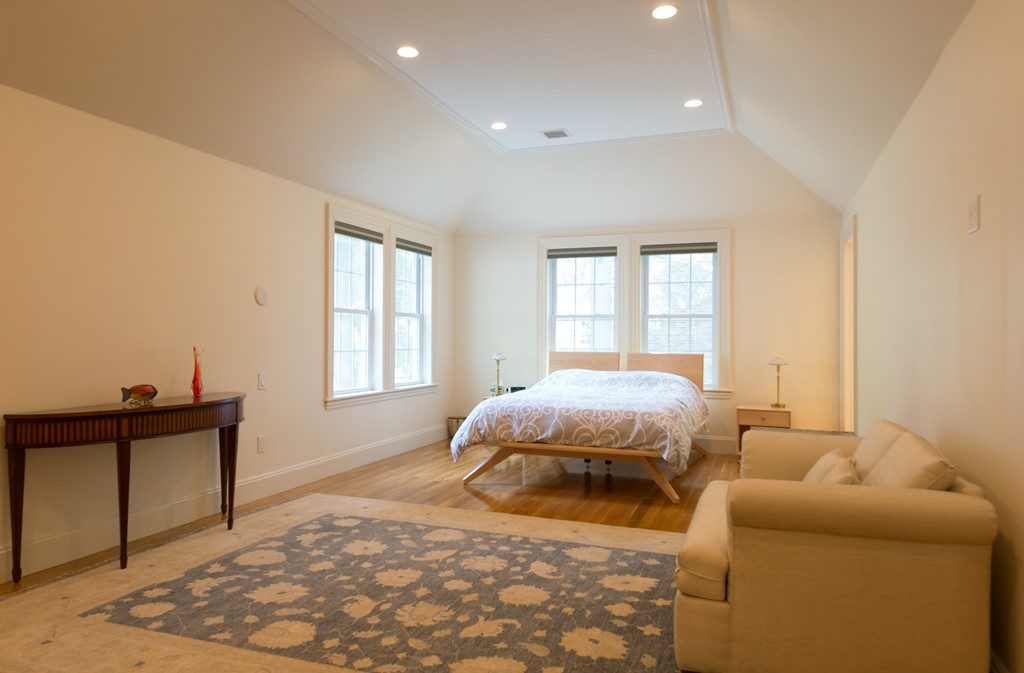 139 Arnold Road Newton, MA 02459 - Photo 17 of 30 a bedroom with a bed and a window