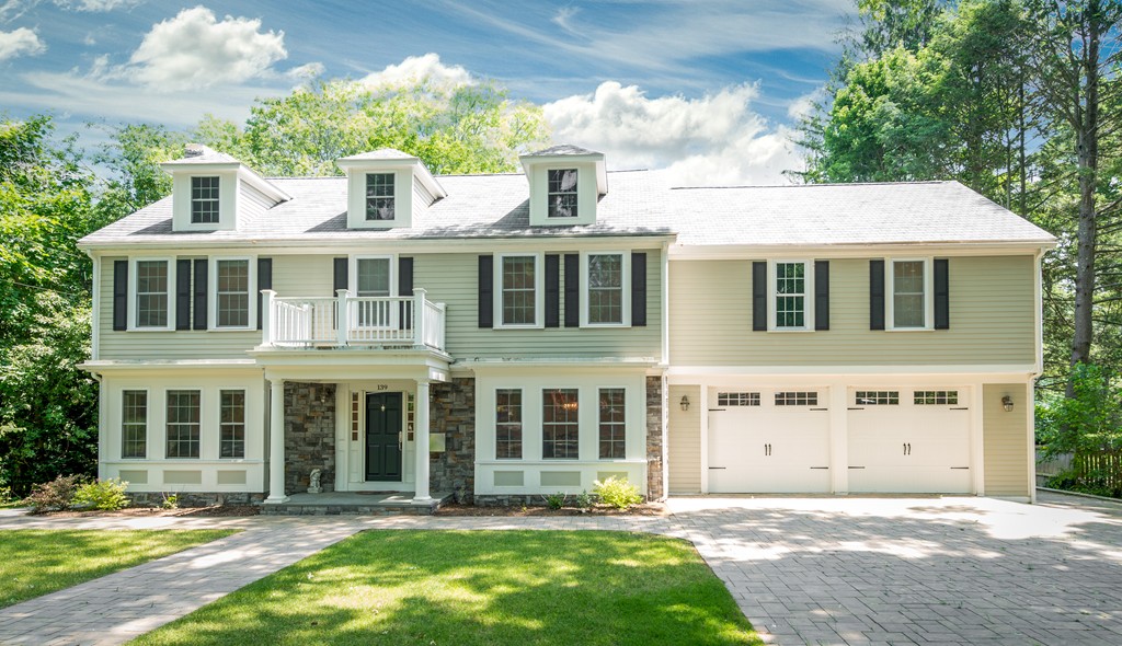 139 Arnold Road Newton, MA 02459 - Photo 2 of 30 a front view of a house with a yard