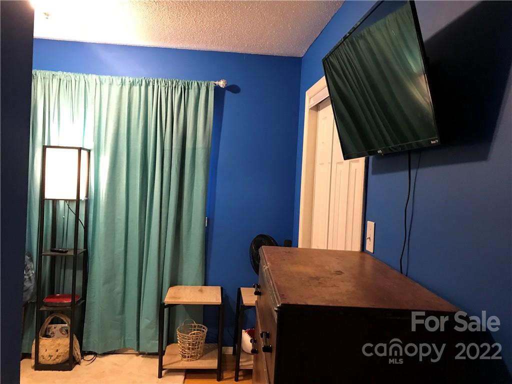1861 Pearidge Road Bostic, NC 28018 - Photo 34 of 40 a view of a room with a window and chair