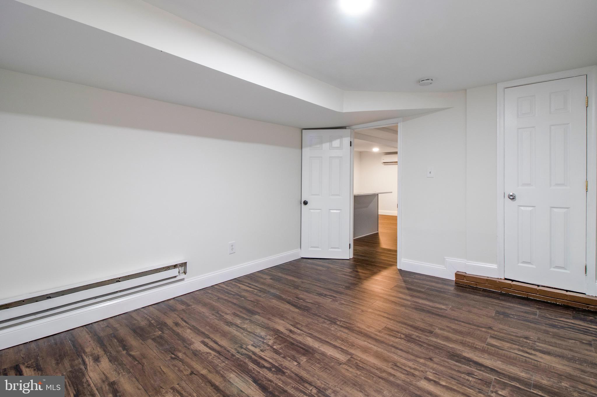 104 15th Street Southeast, Unit B Washington, DC 20003 - Photo 13 of 18 a view of empty room with wooden floor