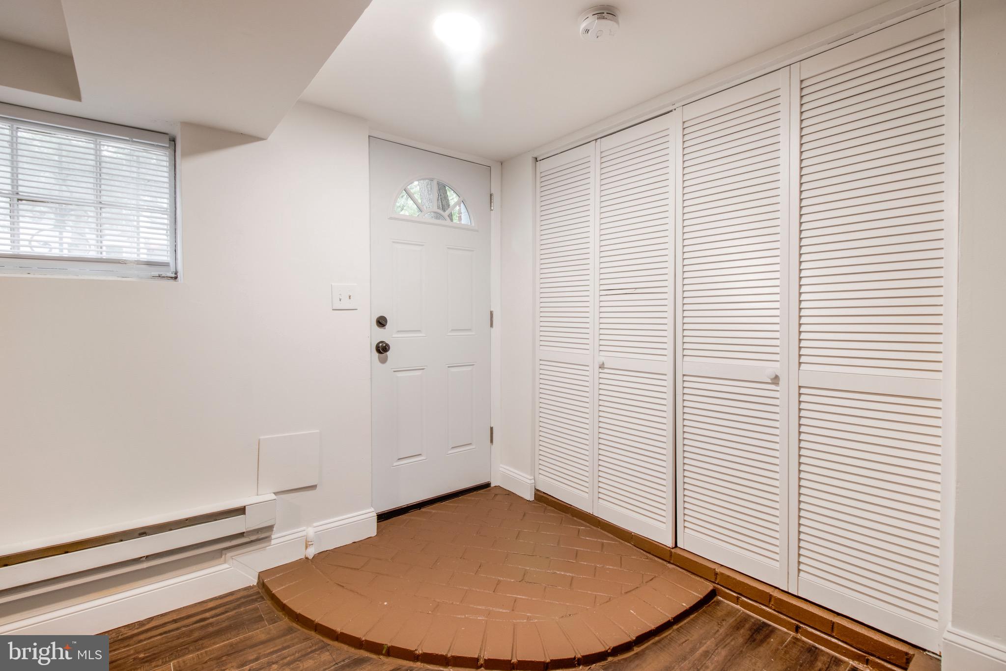 104 15th Street Southeast, Unit B Washington, DC 20003 - Photo 3 of 18 wooden floor in an empty room