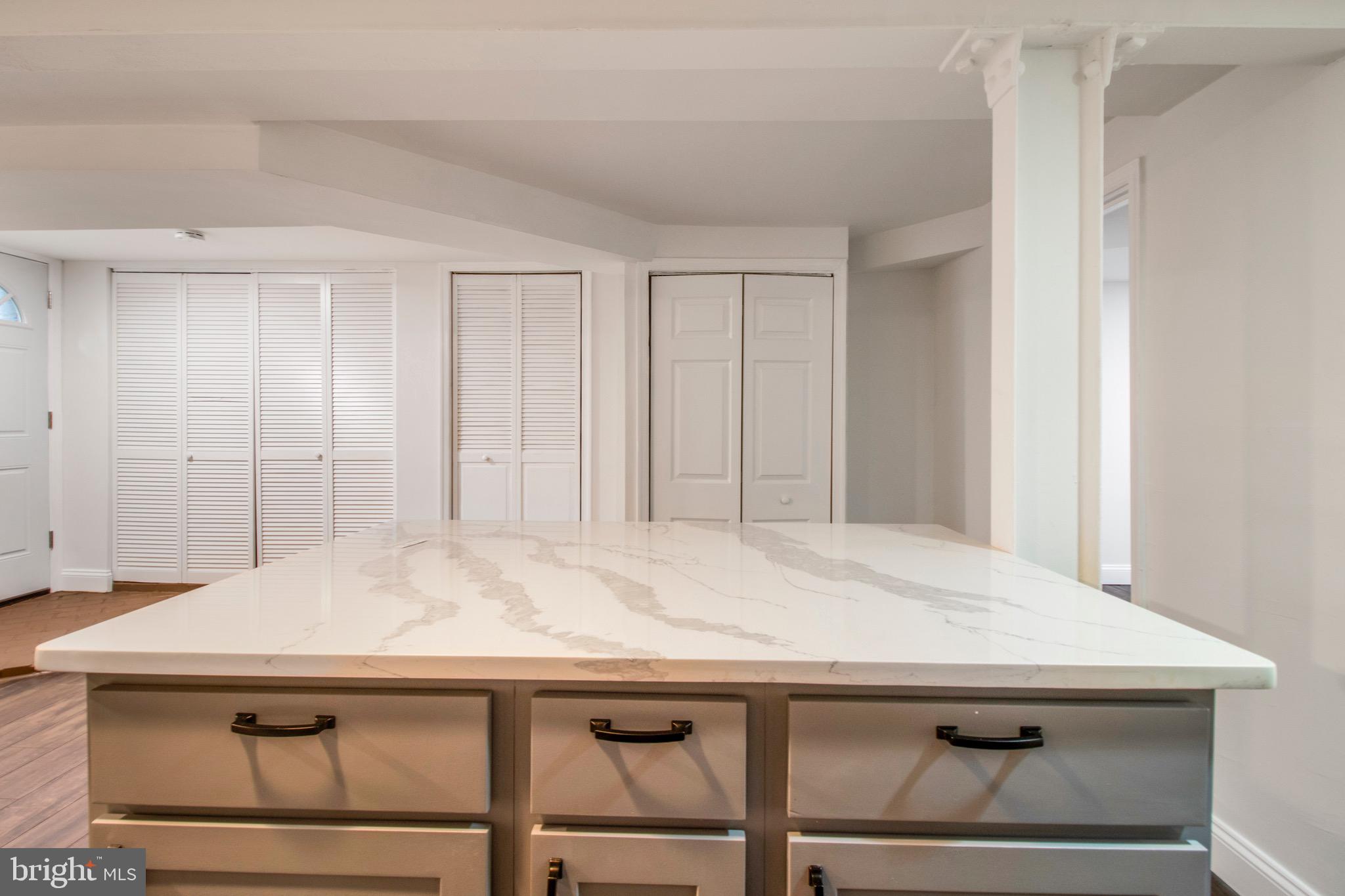 104 15th Street Southeast, Unit B Washington, DC 20003 - Photo 10 of 18 a kitchen with a table and chairs