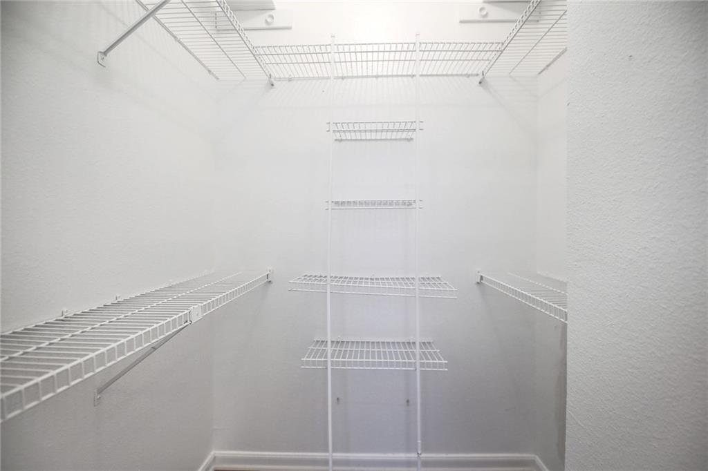 2529 Rio Grande Street, Unit 93 Austin, TX 78705 - Photo 10 of 19 This closet features white wire shelving and hanging rods