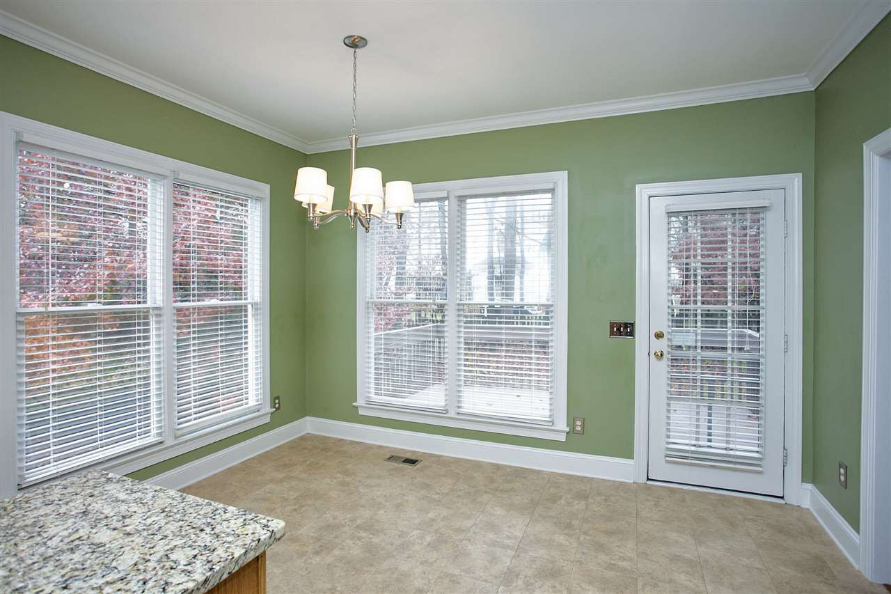5216 Covington Bend Drive Raleigh, NC 27613 - Photo 6 of 15 The breakfast room is perfectly situated off of the kitchen, and adjacent to the door leading to the deck. Breakfast Room