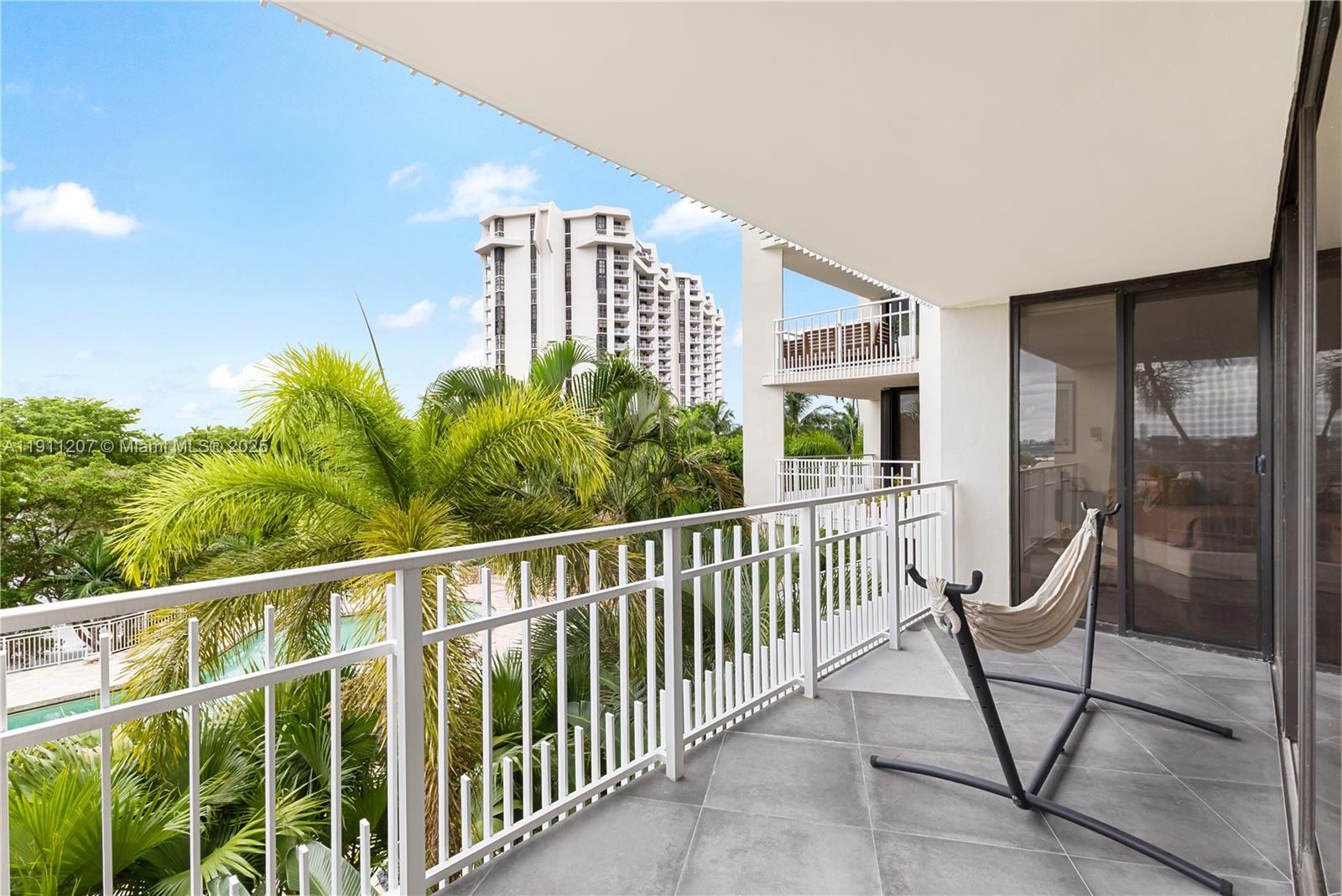1000 Quayside Terrace, Unit 506 Miami, FL 33138 - Photo 22 of 42 a view of a chair and table in the balcony