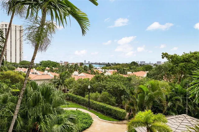 a view of a yard and mountain