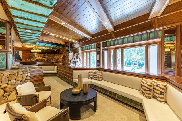 a outdoor living space with patio furniture and a potted plant