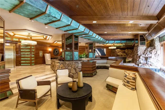 a outdoor patio with a table and chairs