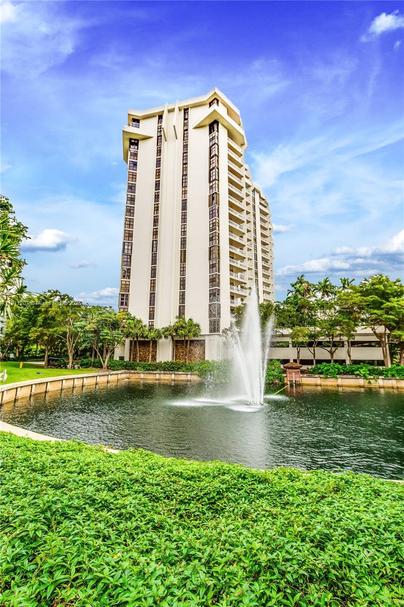 1000 Quayside Terrace, Unit 506 Miami, FL 33138 - Photo 42 of 42 a view of a large building with a big yard