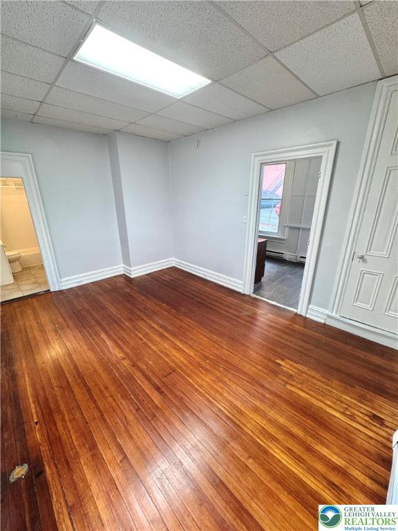 122 North 8th Street, Unit AAA Allentown, PA 18101 - Photo 6 of 9 a view of empty room with wooden floor