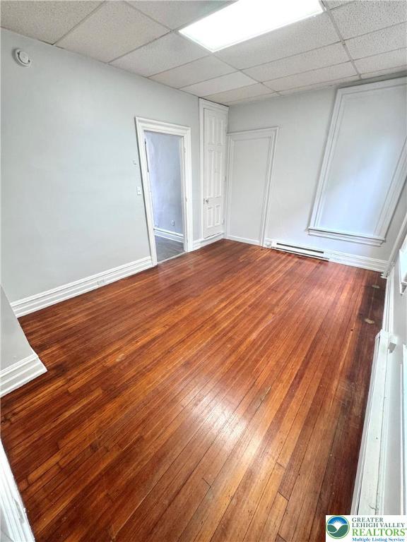 122 North 8th Street, Unit AAA Allentown, PA 18101 - Photo 7 of 9 a view of empty room with wooden floor and fan