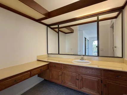 a view of room with floor to ceiling windows with wooden floor