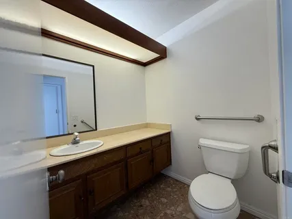 a view of a hallway with a window