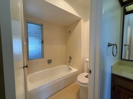 a view of a room with a large window