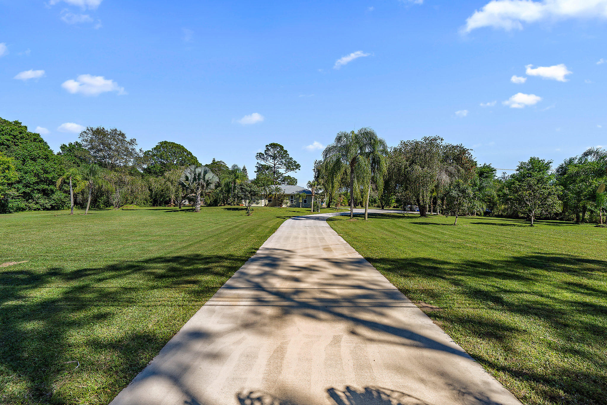 15832 Jupiter Farms Road Jupiter, FL 33478 - Photo 21 of 26 driveway