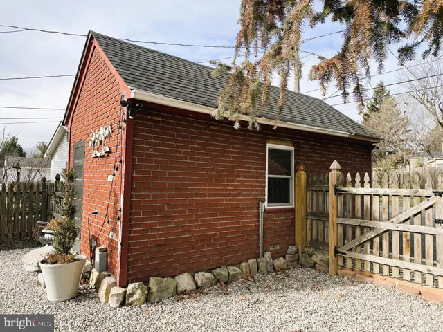 a view of a house with a outdoor space and shower