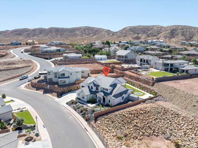 1192 East Corral Way Washington, UT 84780 - Photo 81 of 81 Modern residential property featuring a multi-level design and a dark gray roof