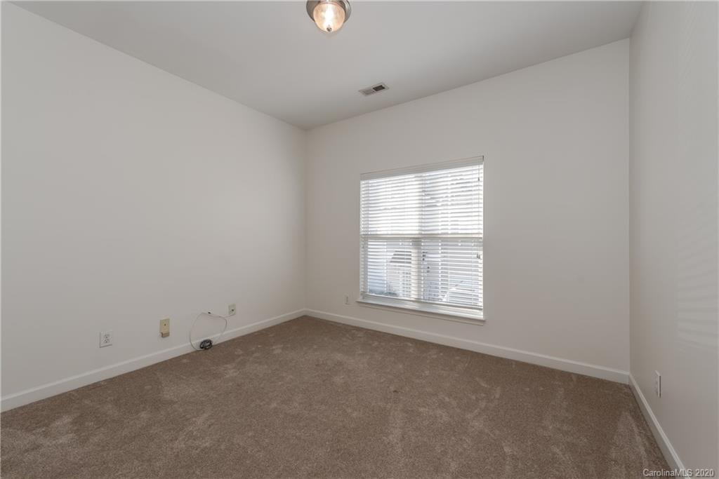 8337 Scotney Bluff Avenue Charlotte, NC 28273 - Photo 25 of 31 an empty room with a window