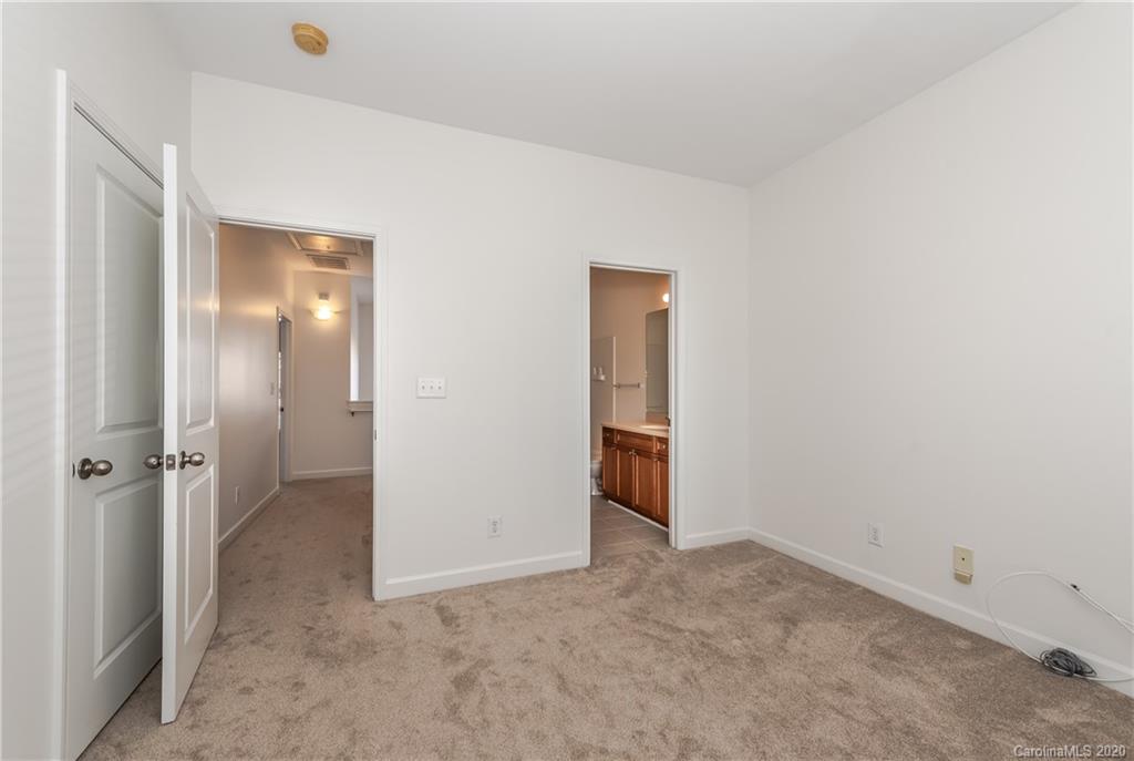 8337 Scotney Bluff Avenue Charlotte, NC 28273 - Photo 26 of 31 an empty room with a bathroom