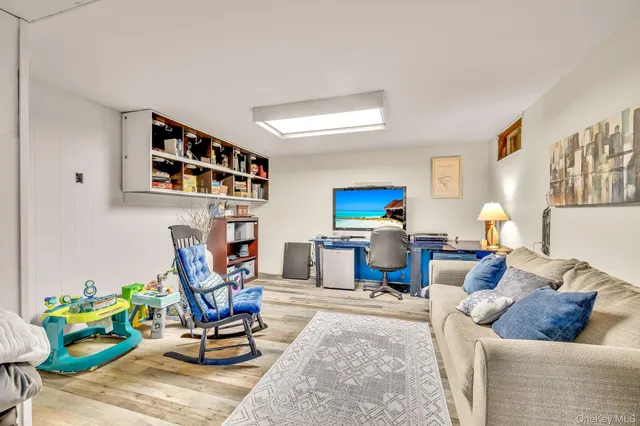 a kitchen that has a lot of cabinets a sink and appliances in it