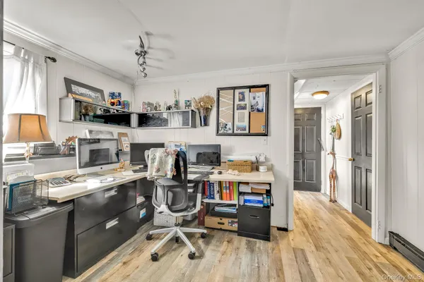 a room with a sink cabinets and window