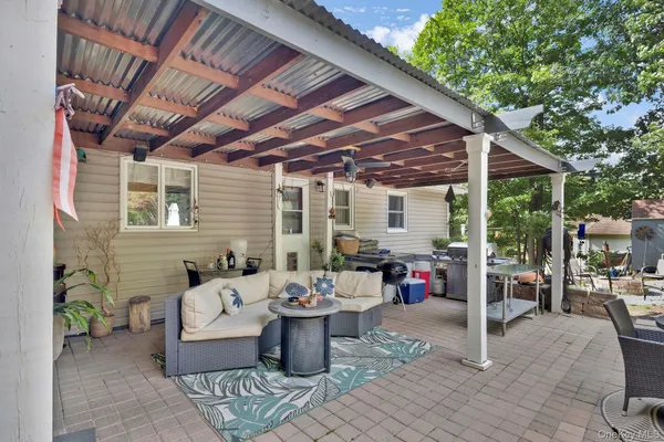 a view of a swimming pool with a patio
