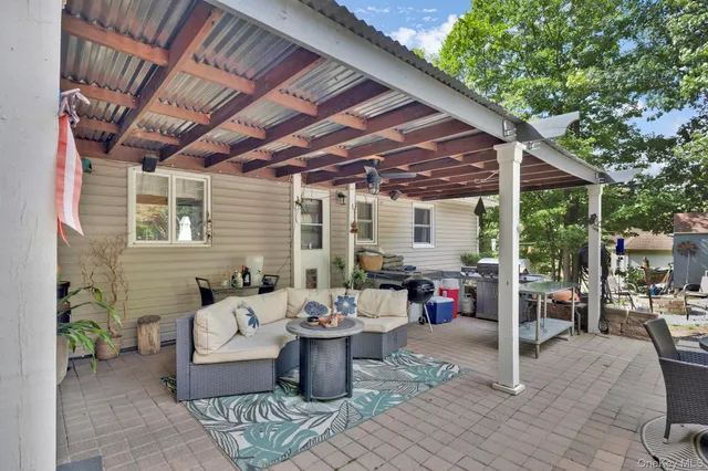 a view of a swimming pool with a patio