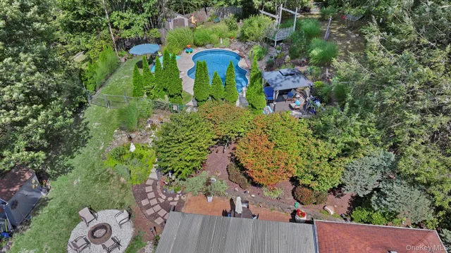 a view of a back yard from a balcony