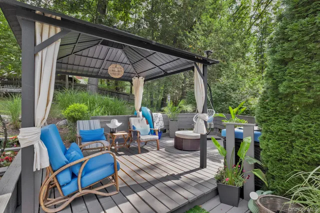 a view of a lush green forest with a park