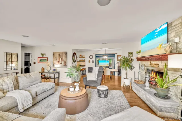 a living room with furniture and a rug