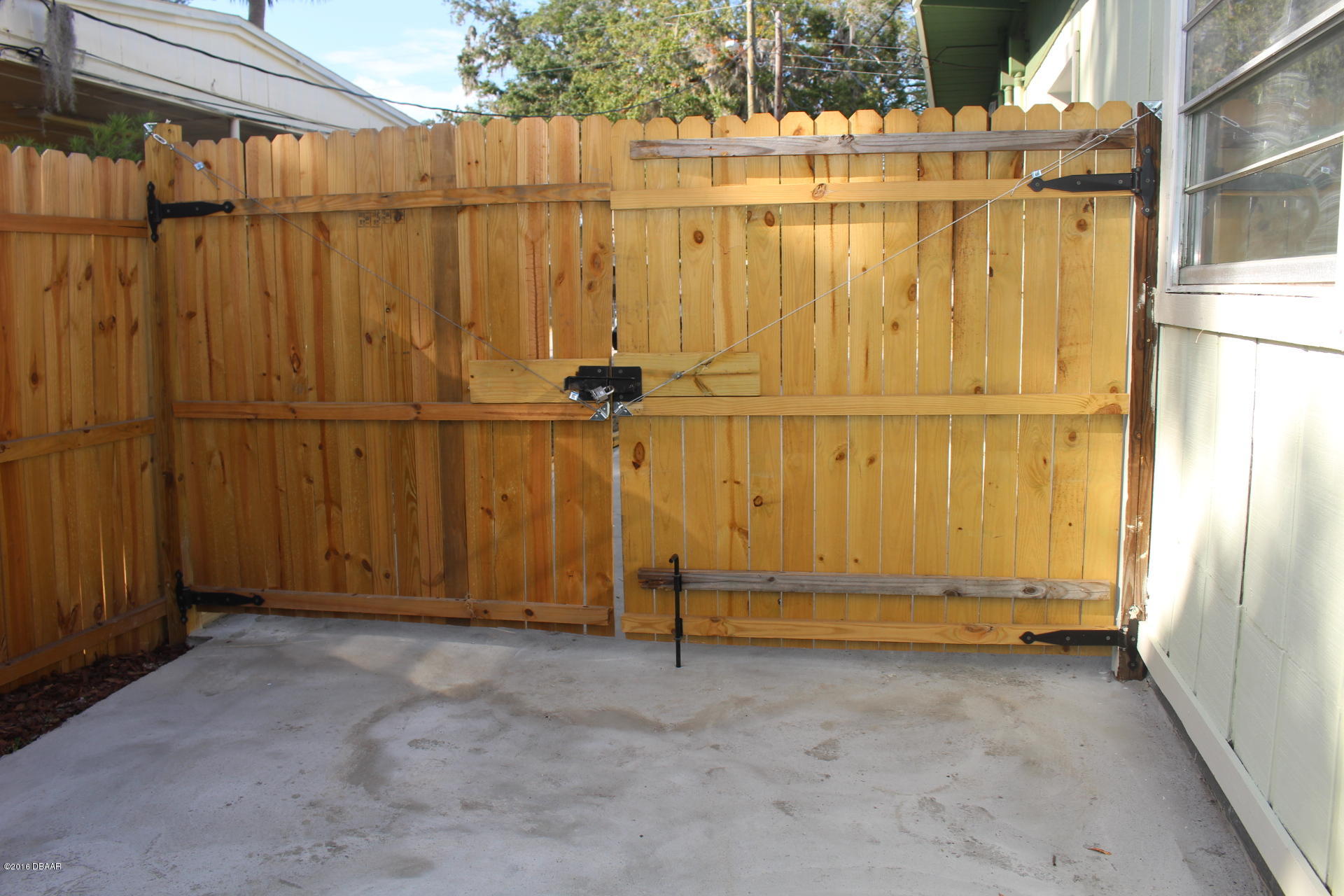 1079 Amanda Road Daytona Beach, FL 32114 - Photo 16 of 20 Gated driveway