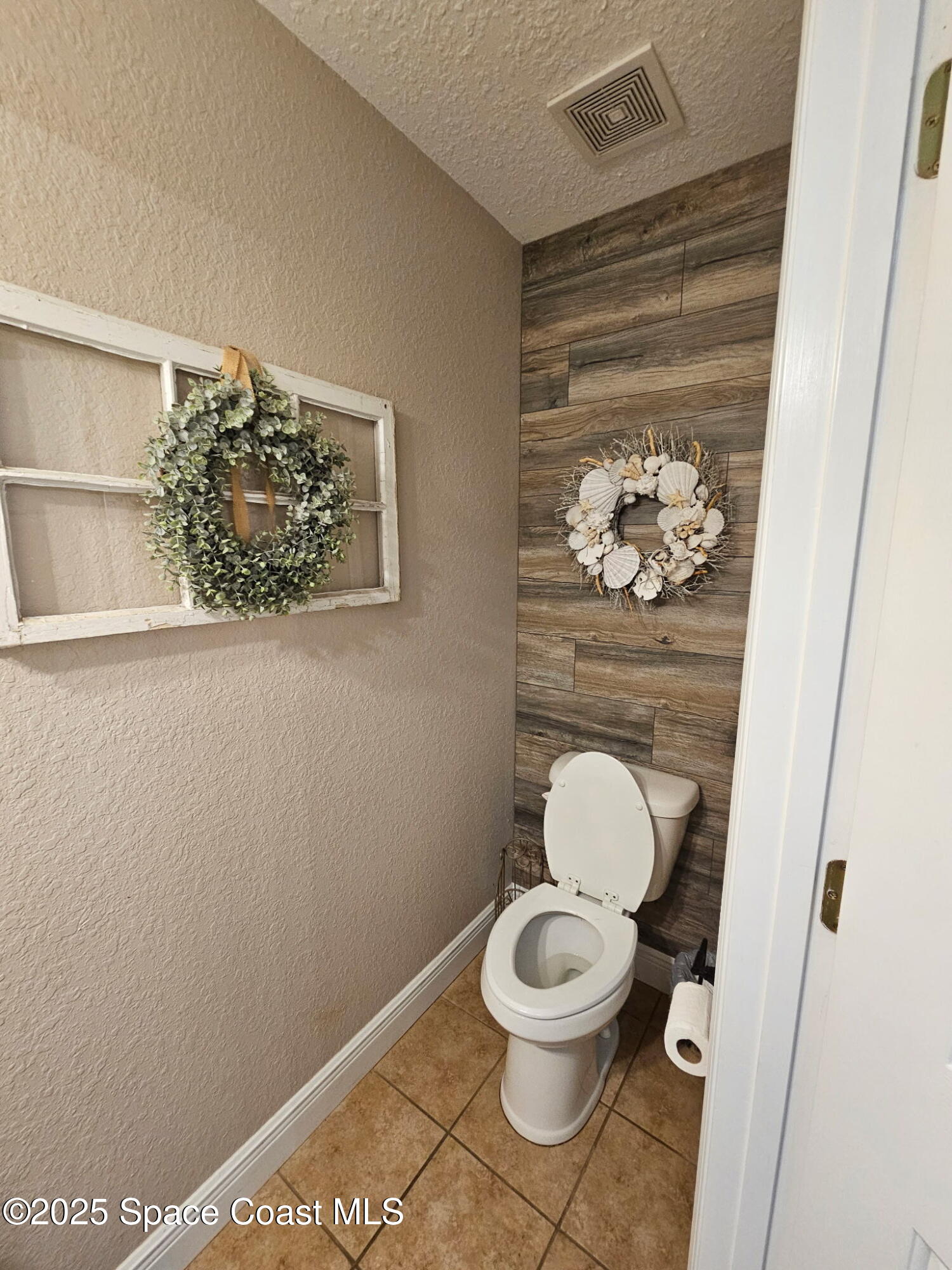 3094 Green Turtle Circle Mims, FL 32754 - Photo 25 of 63 a bathroom with a toilet and a shower