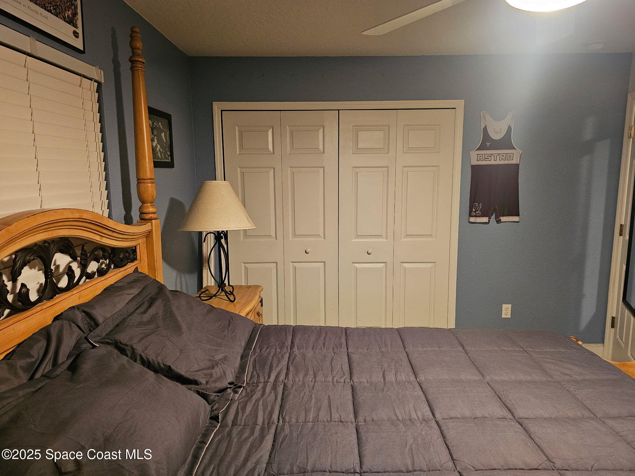 3094 Green Turtle Circle Mims, FL 32754 - Photo 47 of 63 a view of a bedroom with wooden floor and furniture