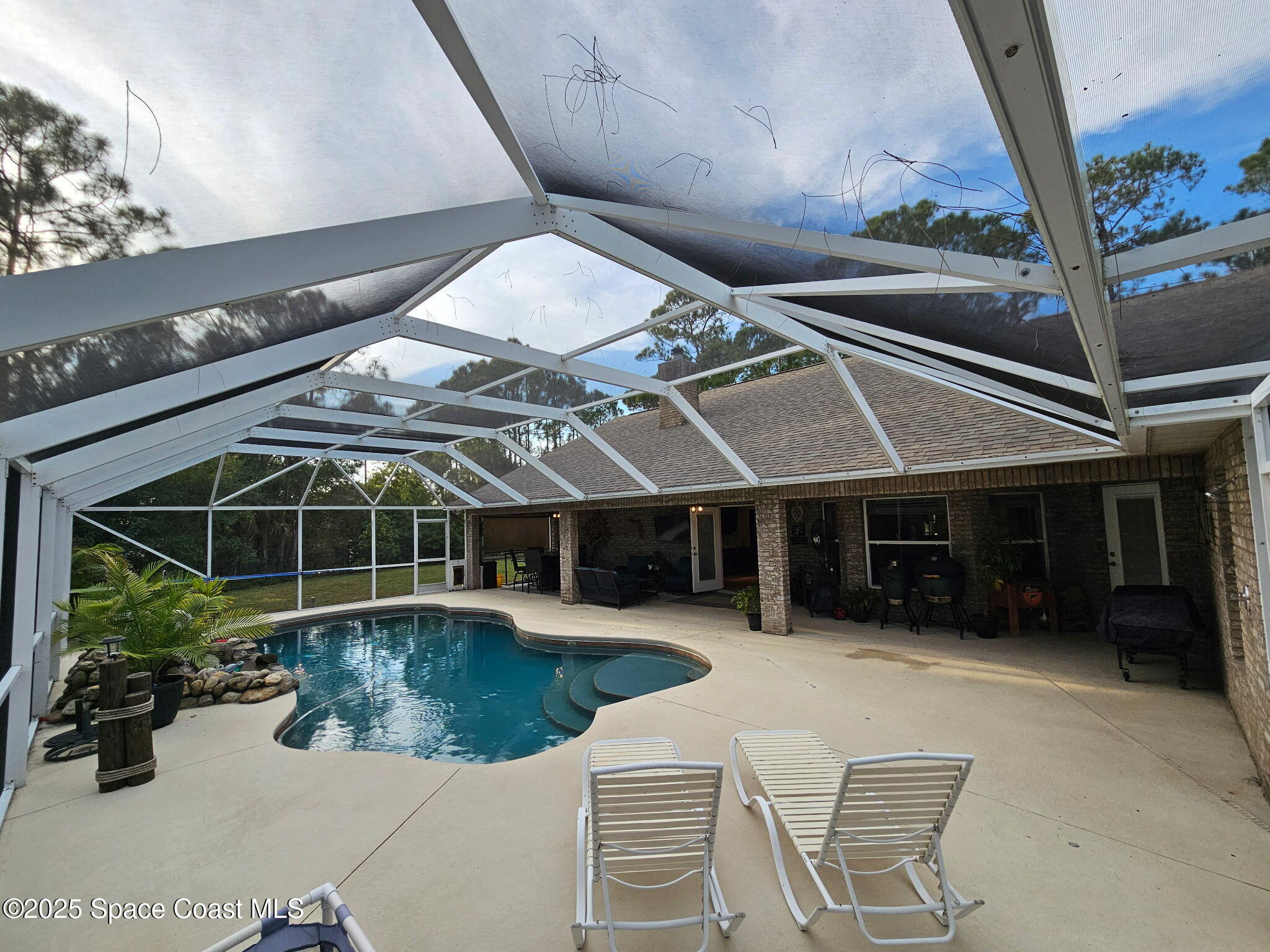 3094 Green Turtle Circle Mims, FL 32754 - Photo 51 of 63 a view of a house with a yard