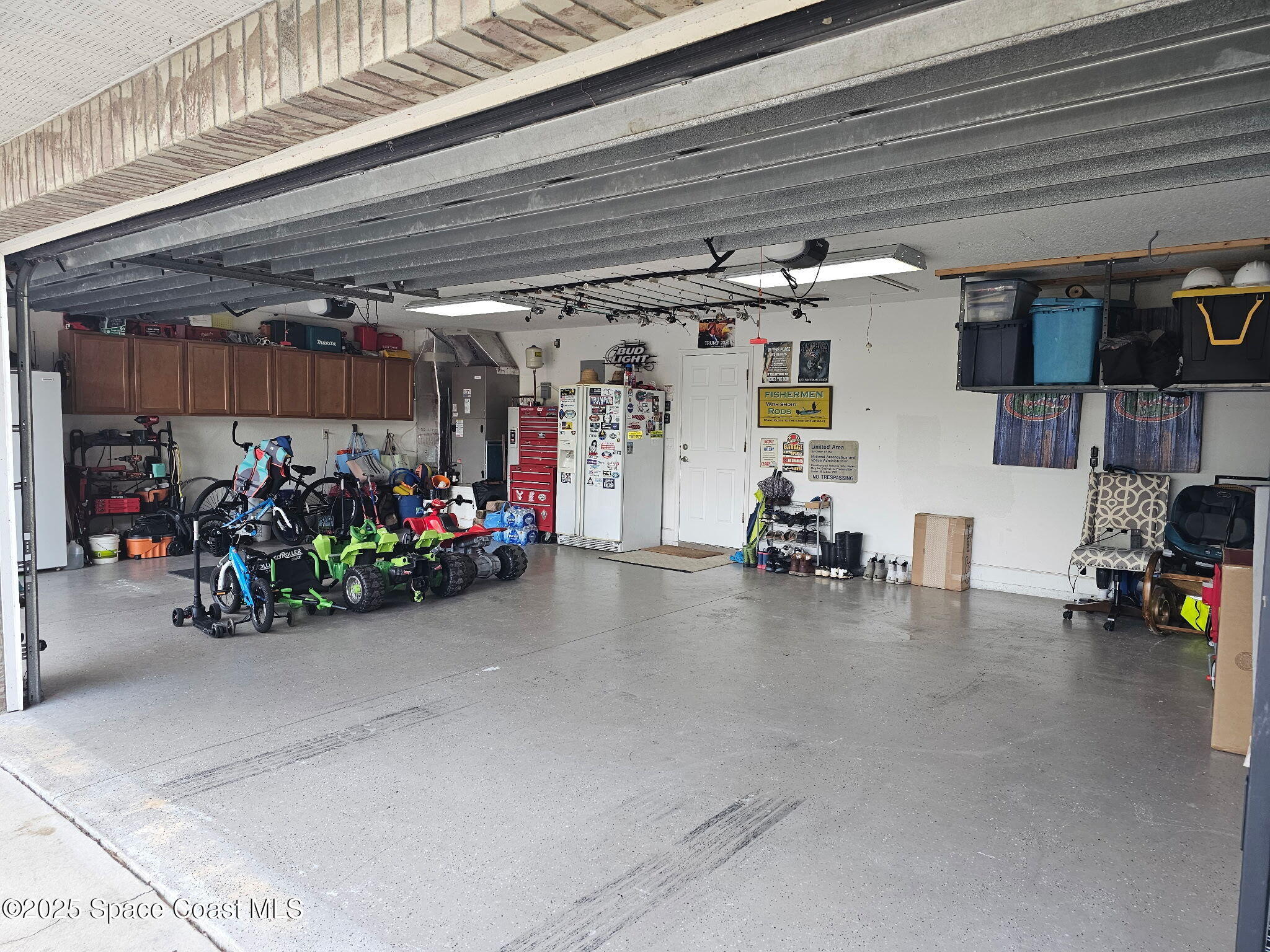 3094 Green Turtle Circle Mims, FL 32754 - Photo 59 of 63 a view of a storage room with a lot of stuff