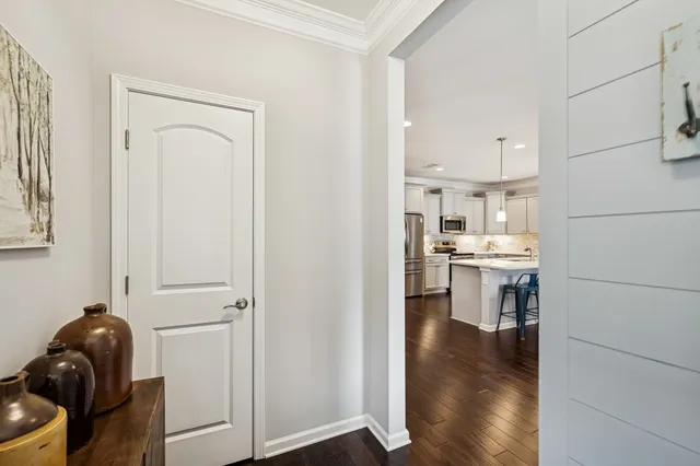 a bedroom with two beds and a large window