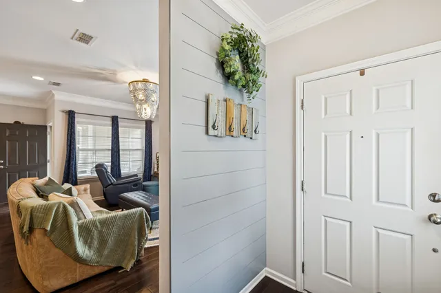 a spacious bathroom with a shower sink and mirror