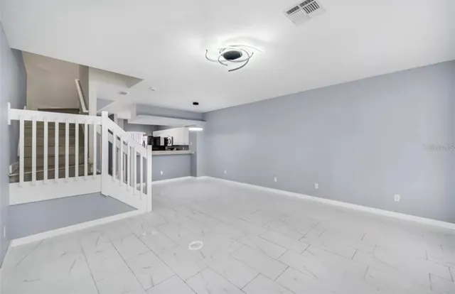 a view of a livingroom with a furniture