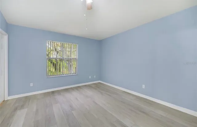 an empty room with windows