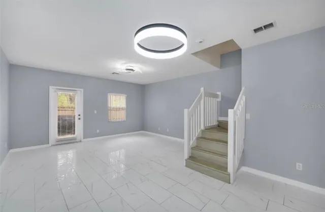 a view of entryway and hall with a window