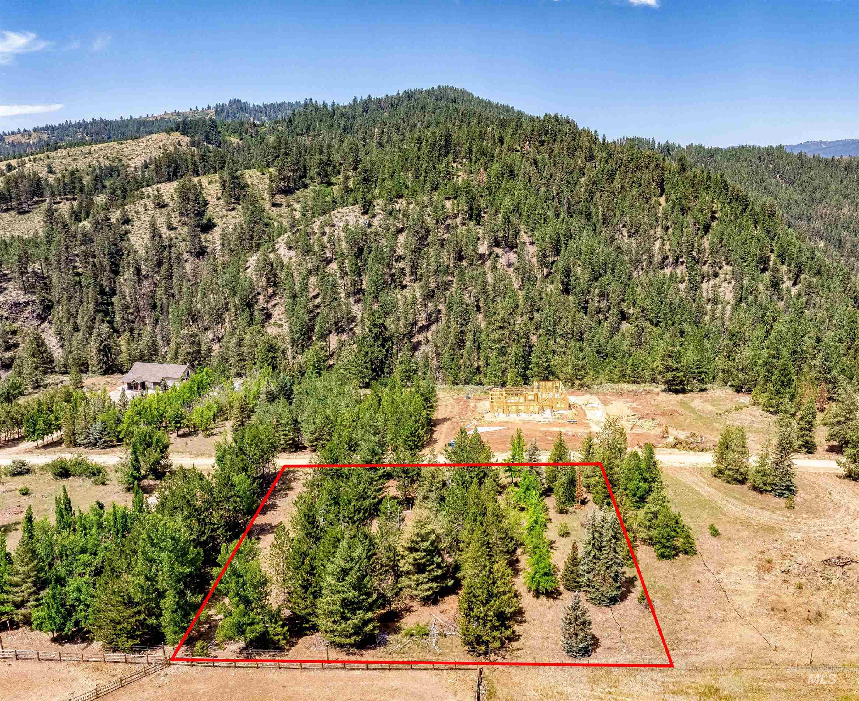 Lot 15 North Corral Flat Road Boise, ID 83716 - Photo 2 of 27 View of property location with property boundaries highlighted and a mountainous background