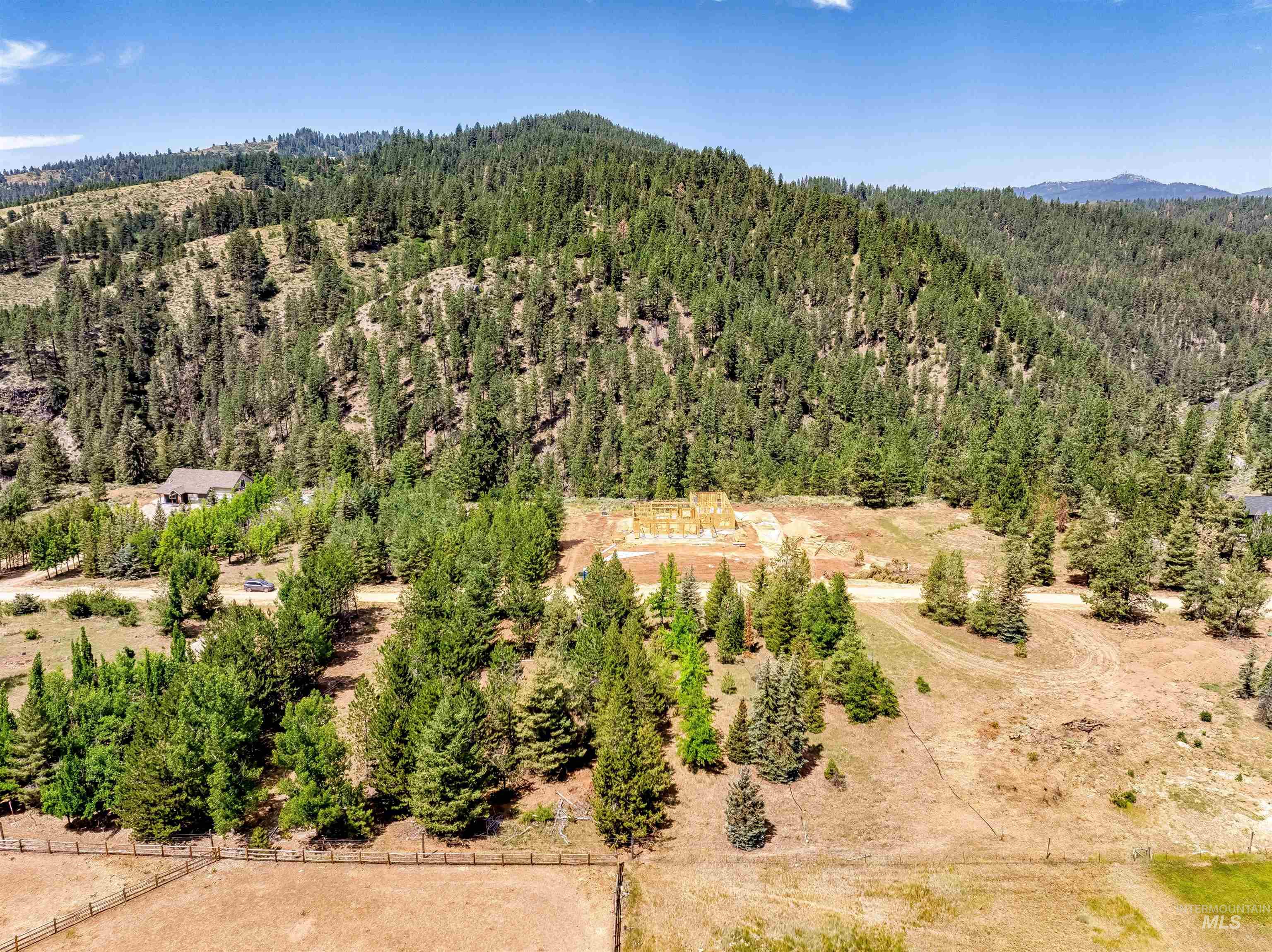 Lot 15 North Corral Flat Road Boise, ID 83716 - Photo 8 of 27 Drone / aerial view of a forest and a mountainous background