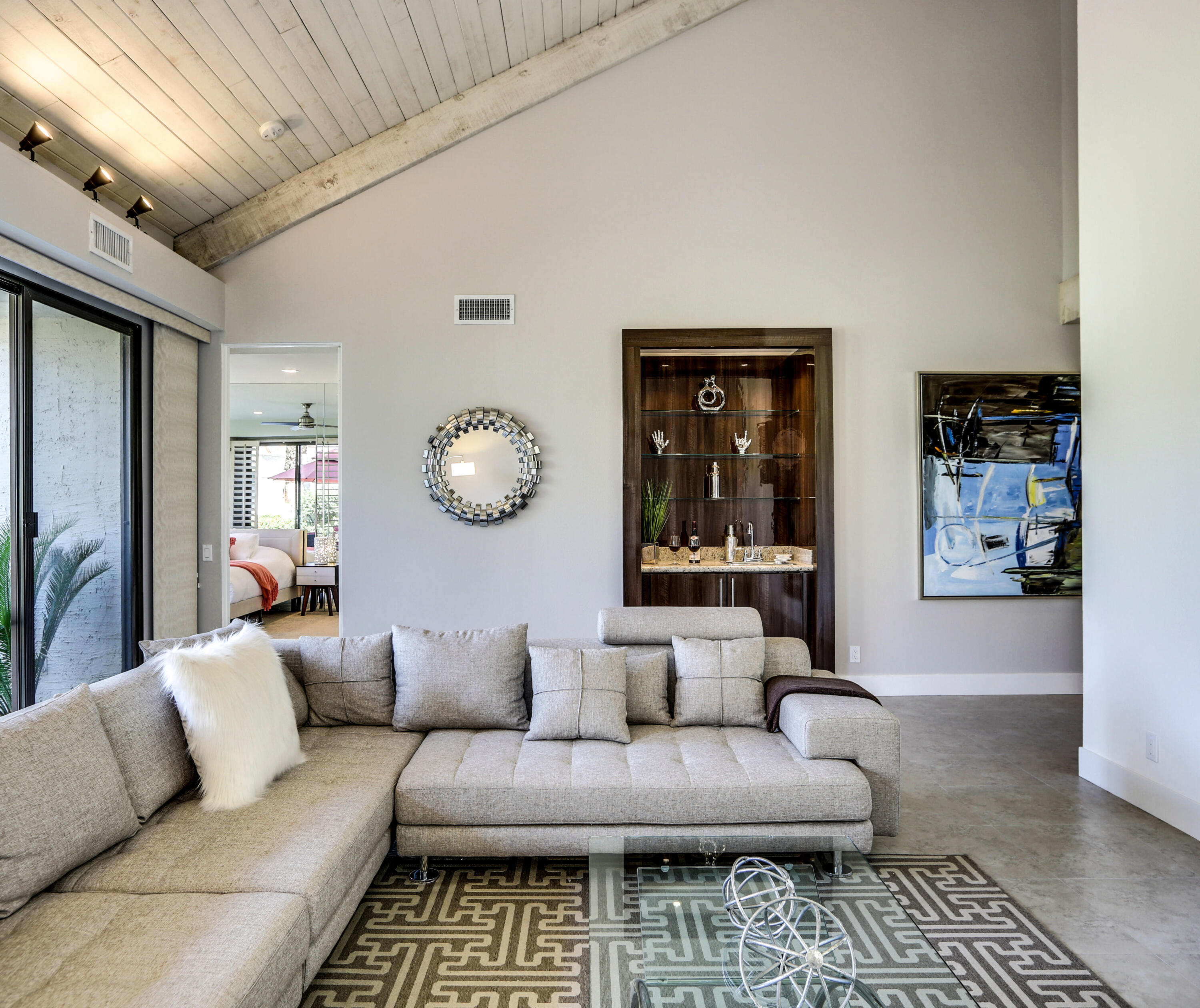 136 Desert W Drive Rancho Mirage, CA 92270 - Photo 12 of 46 a living room with furniture and a rug