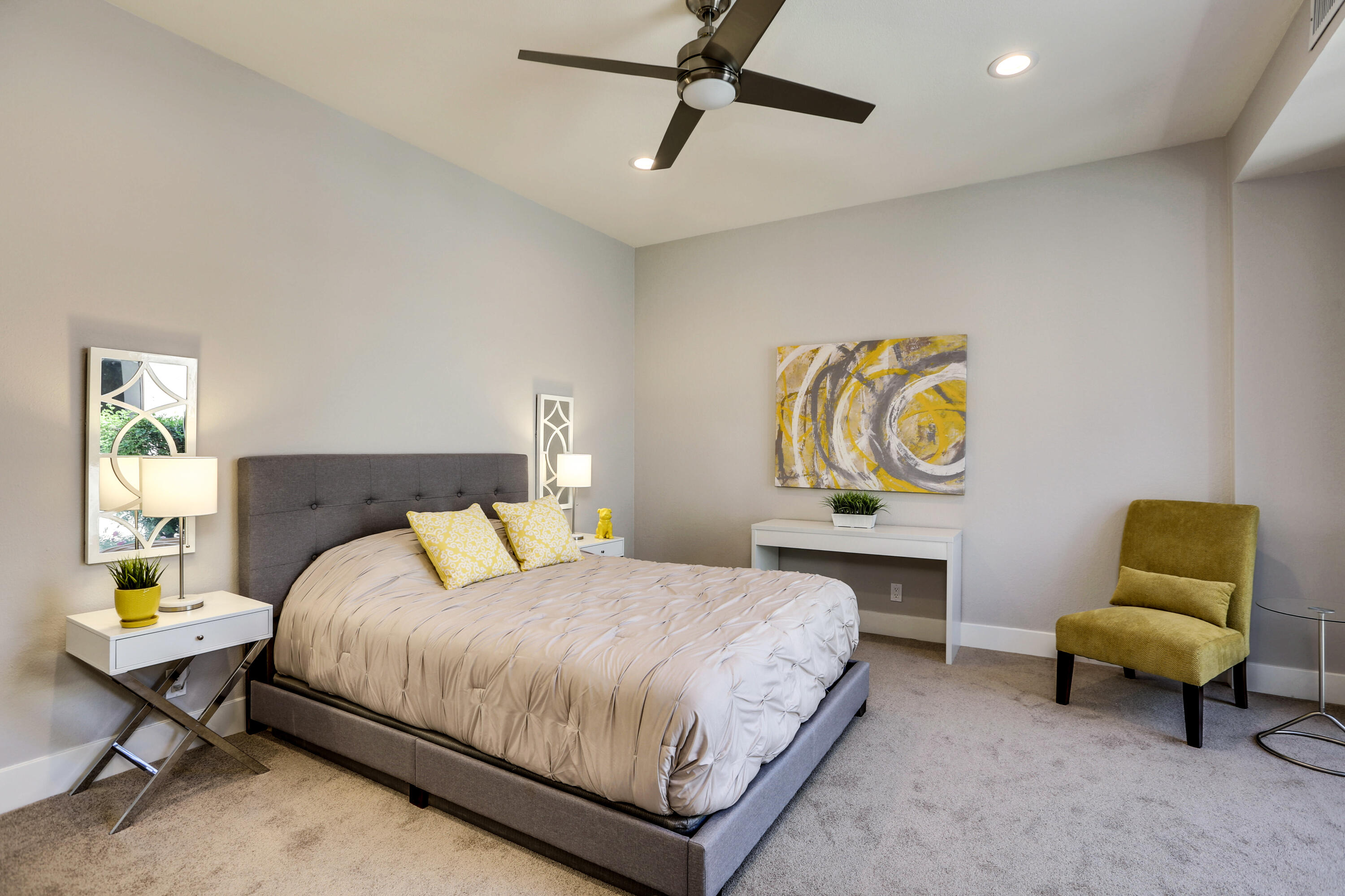 136 Desert W Drive Rancho Mirage, CA 92270 - Photo 24 of 46 a bedroom with a bed and a couch