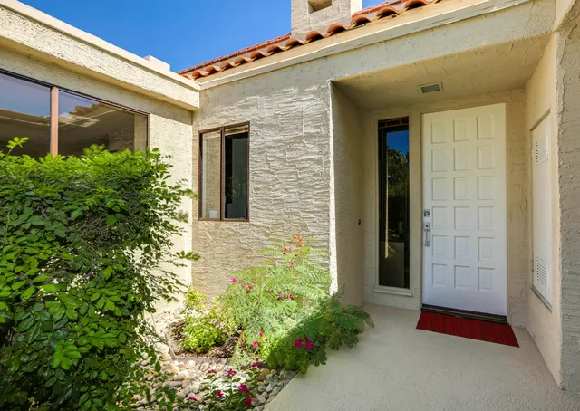 a front view of a house with an outdoor space