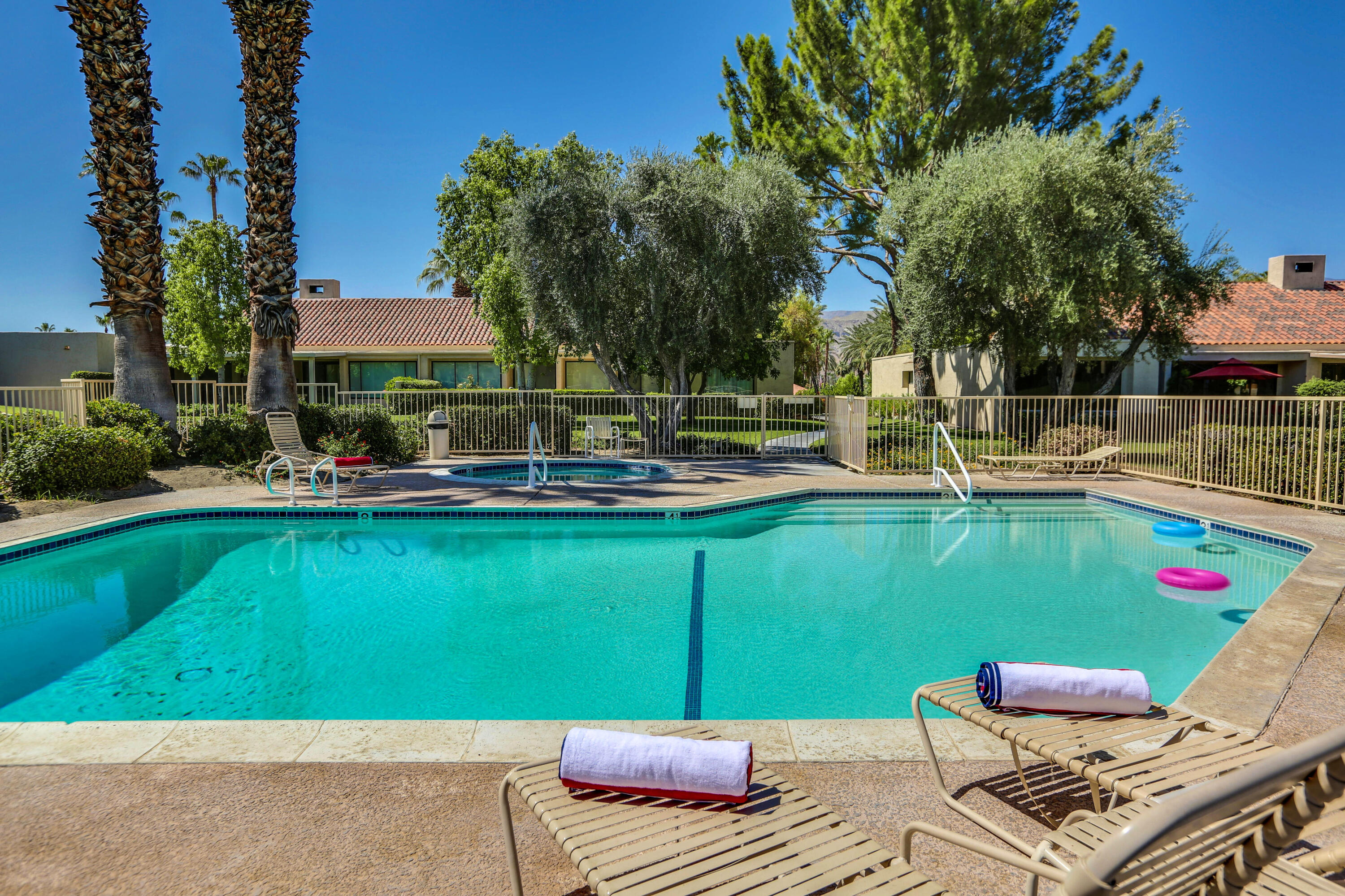 136 Desert W Drive Rancho Mirage, CA 92270 - Photo 45 of 46 a view of a patio with swimming pool