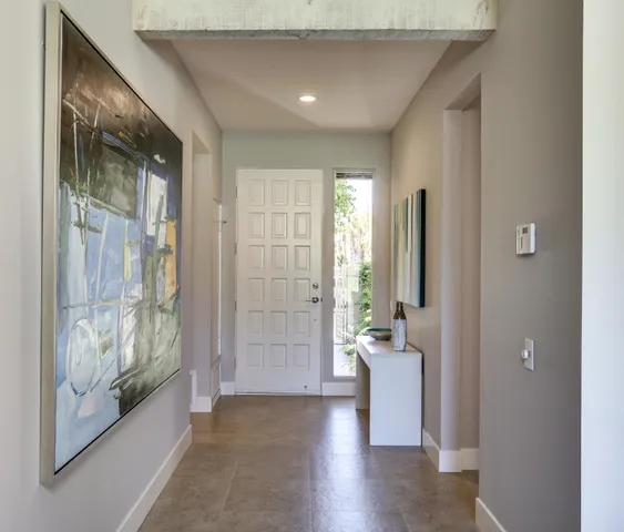 a view of room with window and hardwood floor
