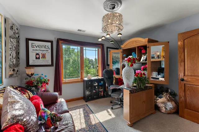 a room filled with furniture and a chandelier