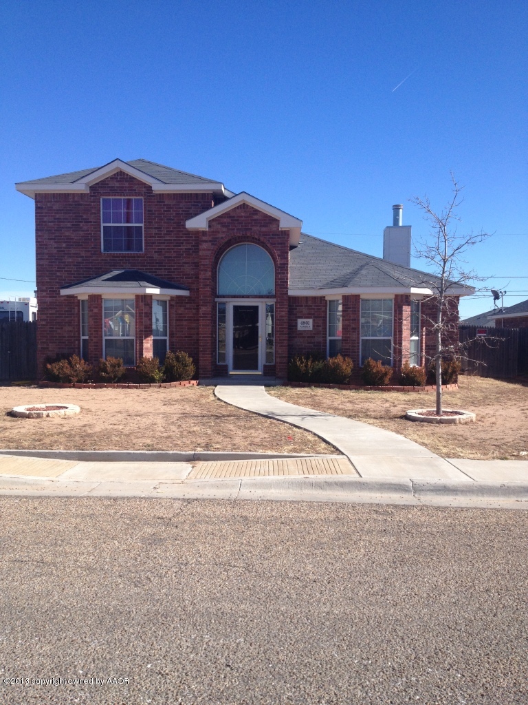 4801 Nimbus Lane Amarillo, TX 79110 - Photo 1 of 40 a front view of a house with a yard